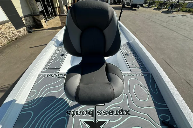 Slide: The Image of 2026 Xpress SW20B boat with custom seating and deck design. - 12