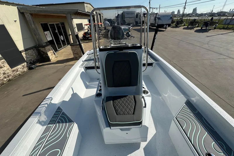 Slide: The Image of 2026 Xpress SW20B boat interior with modern seating and sleek design. - 13