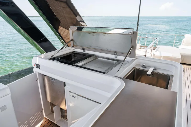 Slide: The Image of Luxurious 2023 Ferretti Yachts 780 deck with ocean view and modern seating. - 19