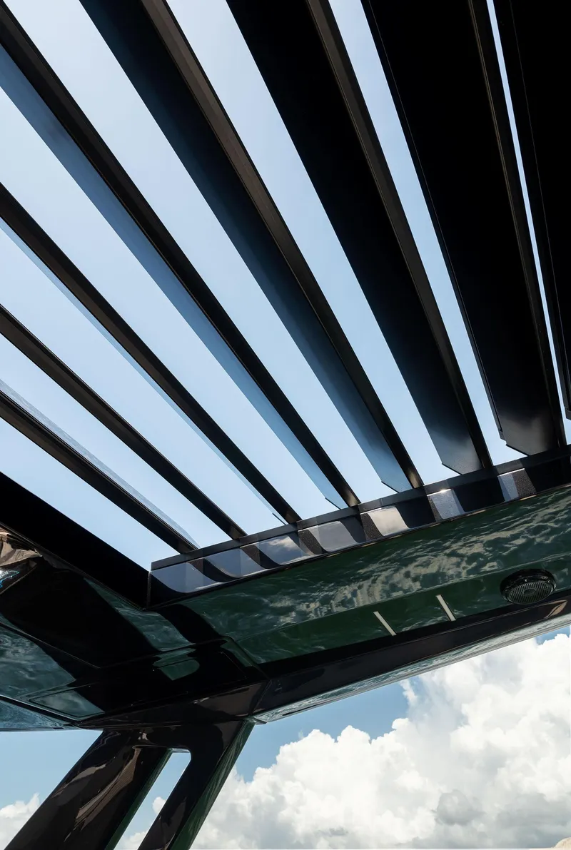 Slide: The Image of Helm of 2023 Ferretti Yachts 780 with ocean view and modern controls. - 27