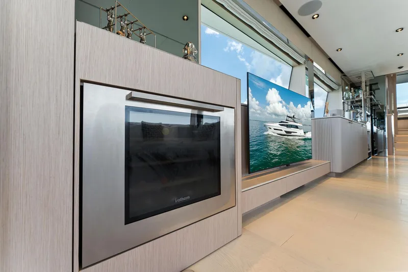 Slide: The Image of Luxurious interior of 2023 Ferretti Yachts 780 with ocean view and modern decor. - 40