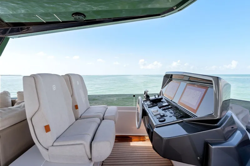 Slide: The Image of Luxurious 2023 Ferretti Yachts 780 deck with ocean view and modern amenities. - 24