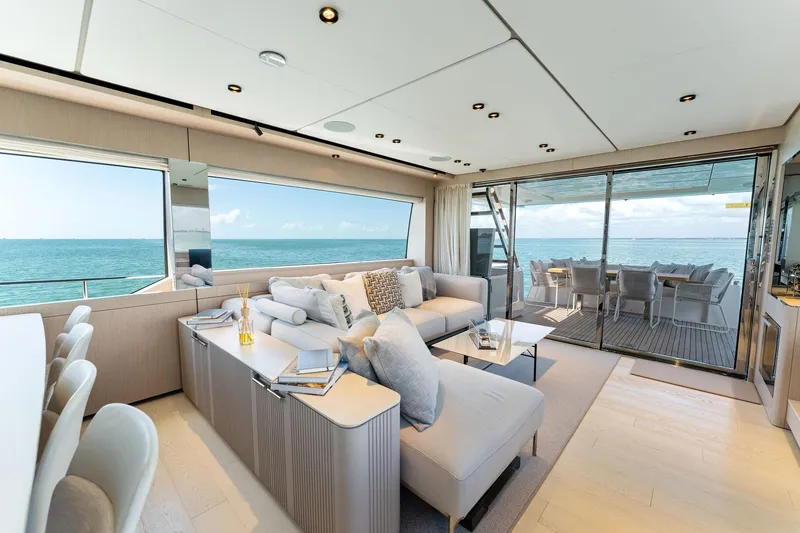 Slide: The Image of Luxurious interior of 2023 Ferretti Yachts 780 with elegant seating and ocean view. - 29
