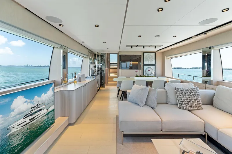 Slide: The Image of Luxurious interior of 2023 Ferretti Yachts 780 with ocean view through large window. - 36