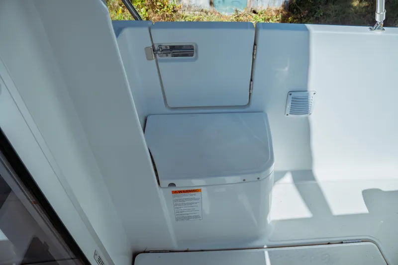 Slide: The Image of 2024 Jeanneau NC 795 Series 2 boat interior, featuring a compact seating area. - 21