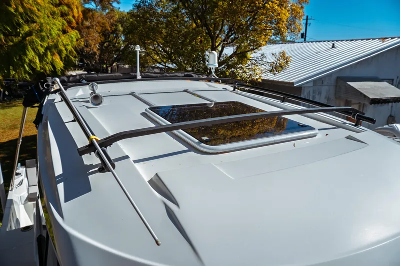 Slide: The Image of 2024 Jeanneau NC 795 Series 2 boat roof with skylight and railings. - 23