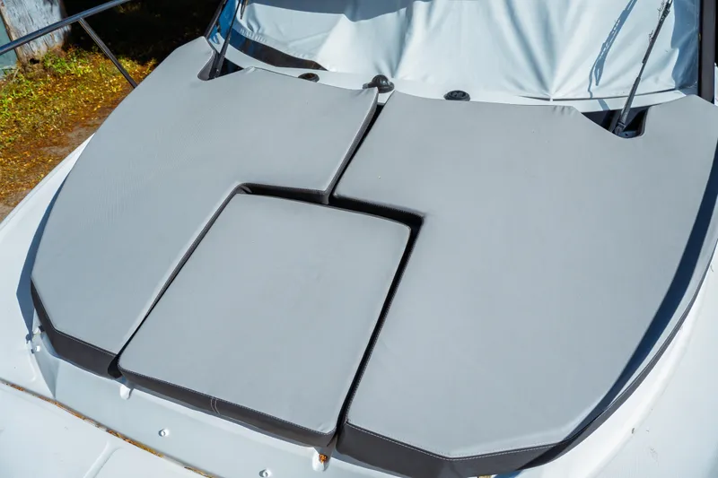 Slide: The Image of 2024 Jeanneau NC 795 Series 2 boat with cushioned deck area. - 26