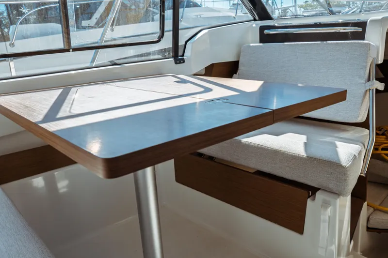 Slide: The Image of Interior of 2024 Jeanneau NC 795 Series 2, featuring a modern dining area. - 33