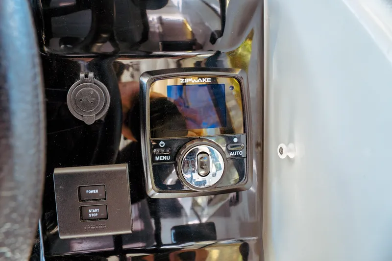 Slide: The Image of Control panel of 2024 Jeanneau NC 795 Series 2 boat with Zipwake system. - 39