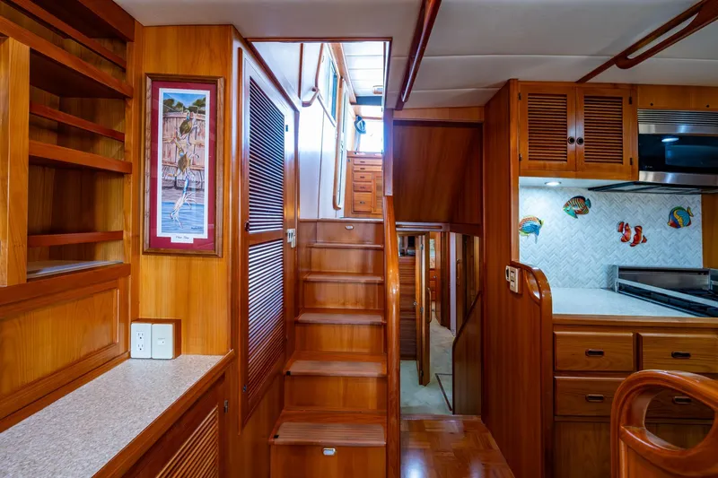 Slide: The Image of Stairs lead up to the pilothouse, or down to the accommodations - 16