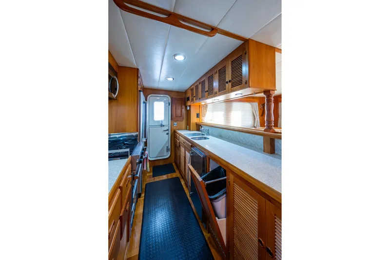 Slide: The Image of In-line galley and side deck entrance door - 17