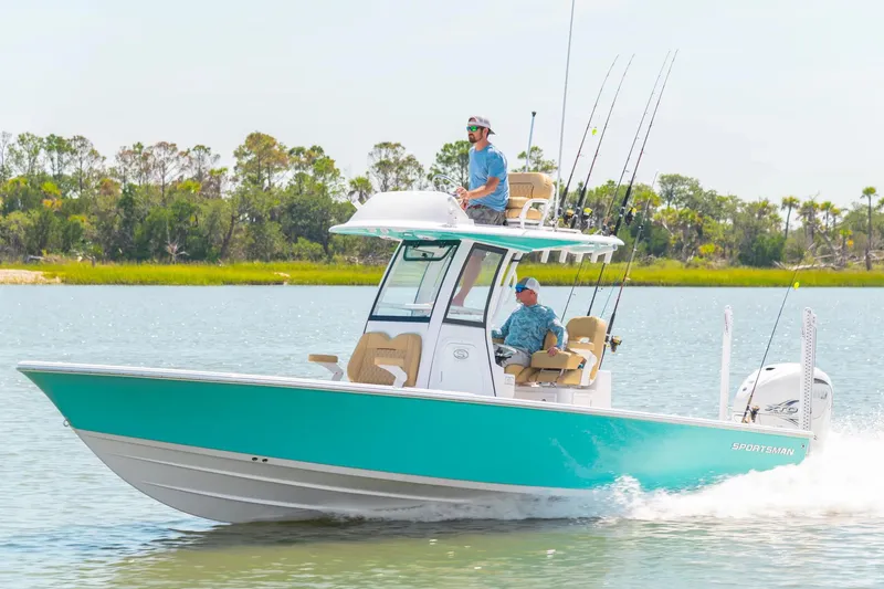 The Image of Manufacturer Provided Image: 2025 Sportsman Masters 267OE Bay Boat cruising on a serene lake. - 0