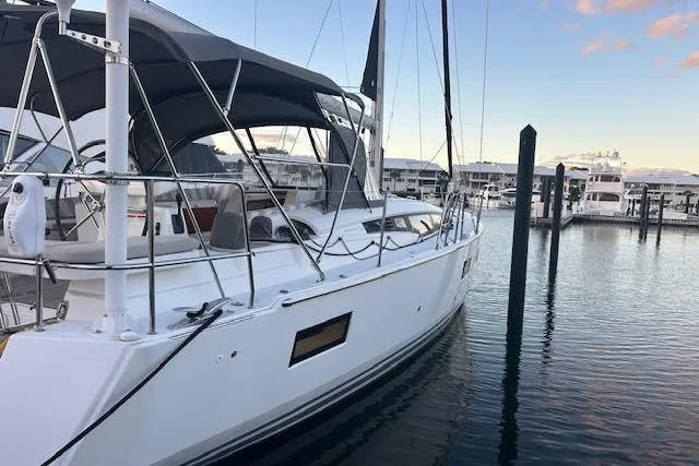 Slide: The Image of 2016 Jeanneau 54 yacht docked at marina, featuring sleek design and modern amenities. - 31