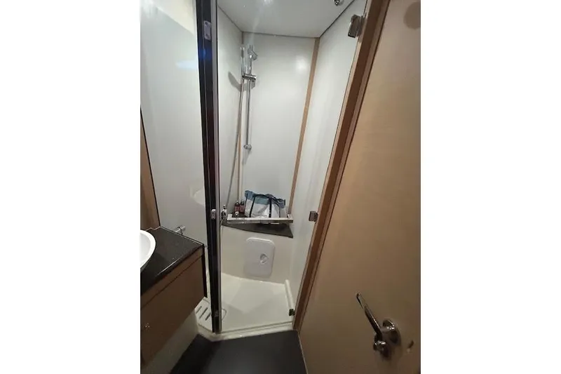 Slide: The Image of Bathroom shower area in a 2016 Jeanneau 54 yacht. - 39