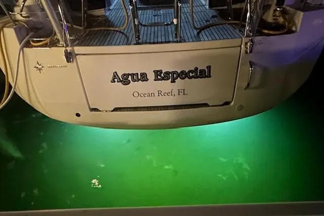 Slide: The Image of Stern of 2016 Jeanneau 54 yacht "Agua Especial" with underwater lights, Ocean Reef, FL. - 44