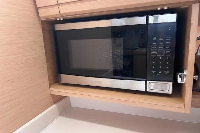 Slide: The Image of Microwave in Jeanneau 54 yacht's wooden kitchen cabinet, 2016 model. - 51