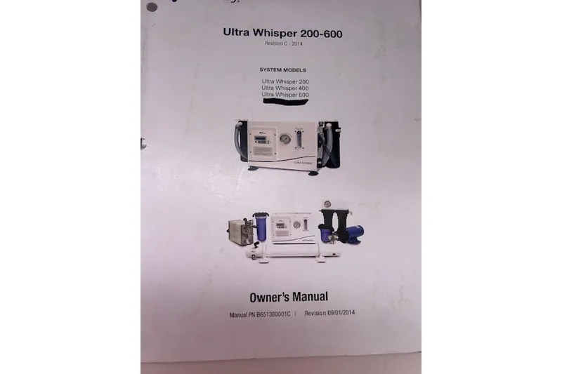 Slide: The Image of Owner's manual cover for Ultra Whisper 200-600 system models, Revision C-2014. - 59