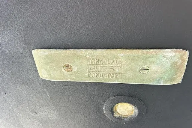 Slide: The Image of Dyna Plate on Jeanneau 54 yacht hull, 2016 model, with "Do Not Paint" warning. - 63