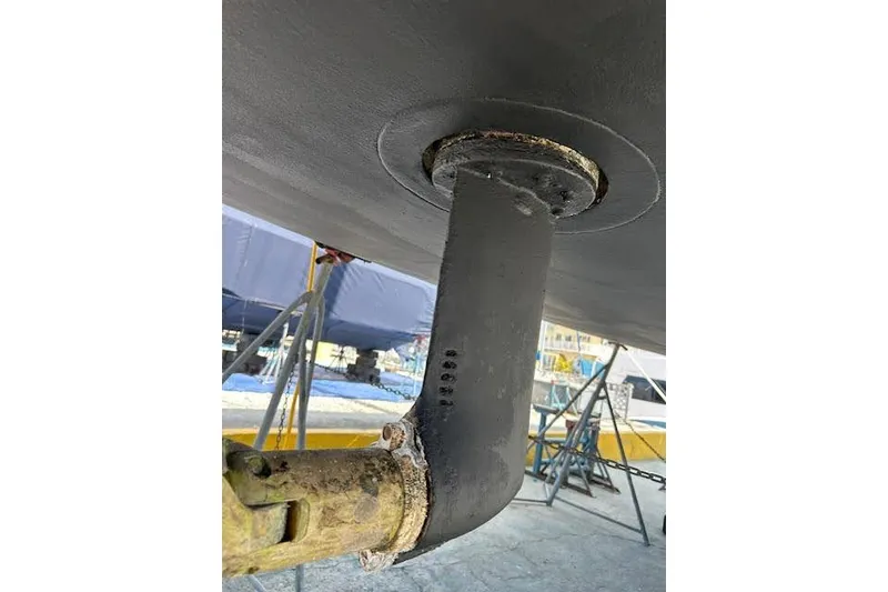 Slide: The Image of Close-up of Jeanneau 54 sailboat propeller shaft, 2016 model, in dry dock. - 65