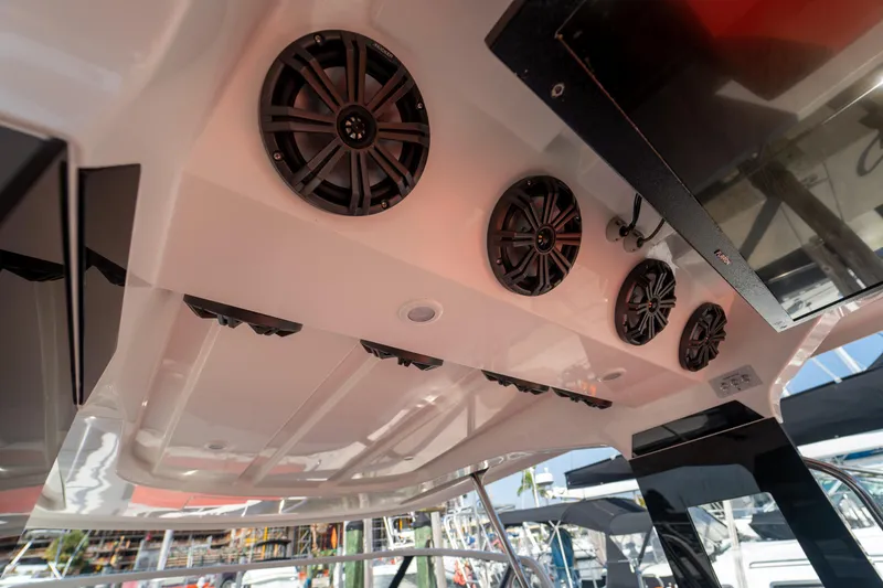 Slide: The Image of Speakers in the ceiling of a 2022 Nimbus T11 boat. - 25