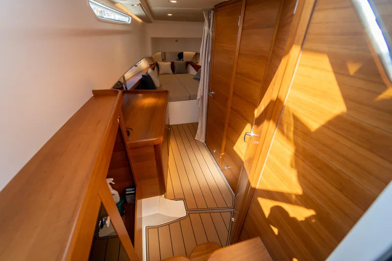 Slide: The Image of Interior of 2022 Nimbus T11 yacht with wooden finish. - 38