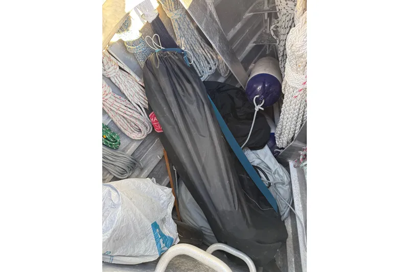 Slide: The Image of Storage area on Boreal 47 sailboat, featuring ropes and equipment, 2017 model. - 20