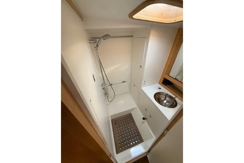 Slide: The Image of Compact bathroom in 2017 Boreal 47 yacht with shower and stainless steel sink. - 26