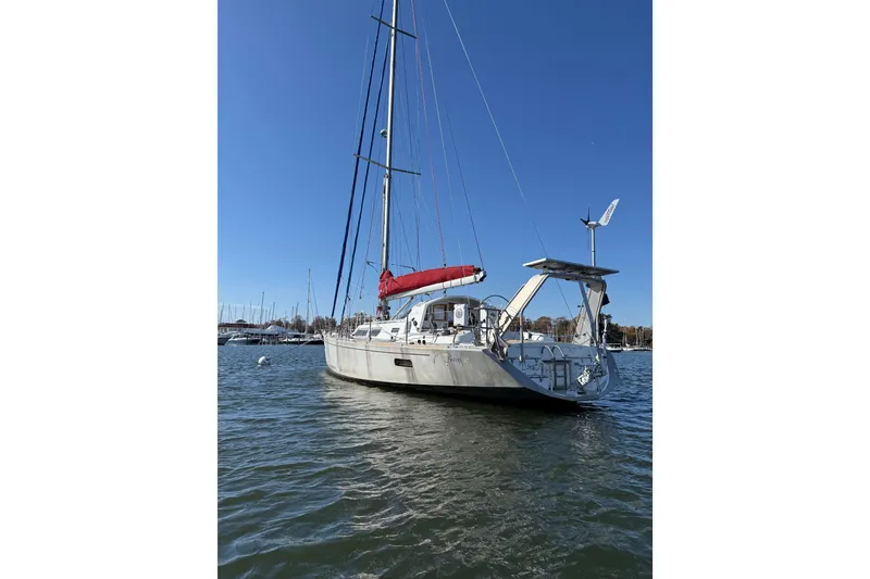 Slide: The Image of Sailing yacht Boreal 47, 2017 model, anchored in a marina under clear blue skies. - 3