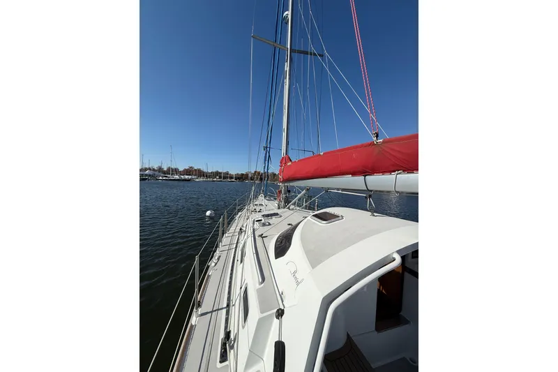 Slide: The Image of Sailboat Boreal 47, 2017 model, docked in a marina under clear blue skies. - 4