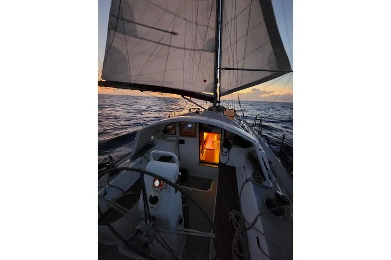 Slide: The Image of Sailing at sunset on a 2017 Boreal 47 yacht, with illuminated cabin. - 7