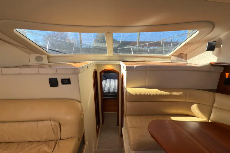 Slide: The Image of Luxurious interior of 2008 Cruisers 455 Motor Yacht with leather seating and natural light. - 18