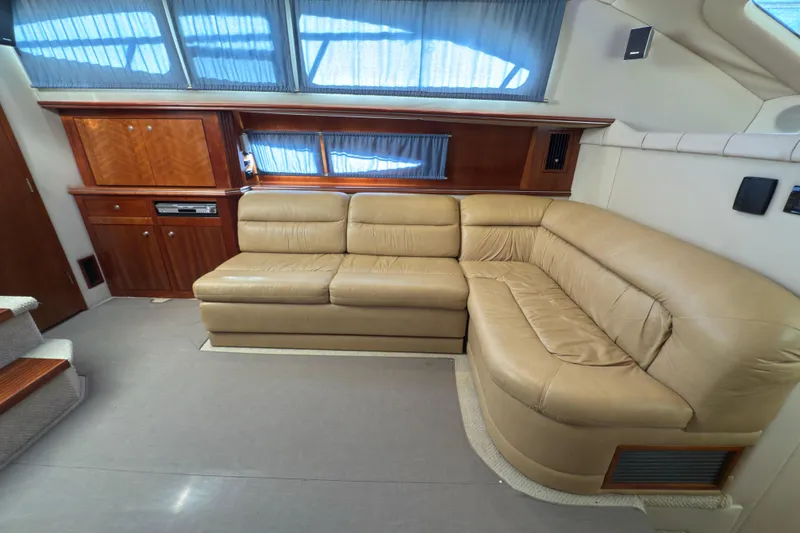 Slide: The Image of Luxurious interior of 2008 Cruisers 455 Motor Yacht with beige leather seating. - 16