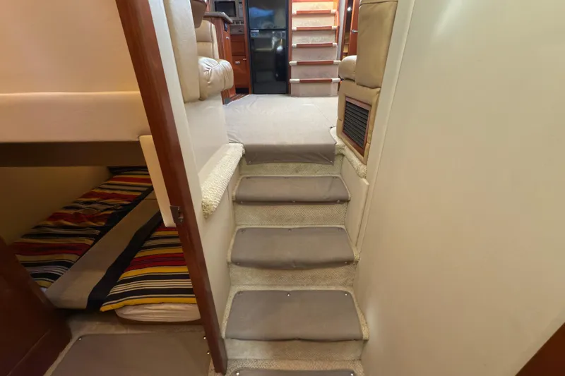 Slide: The Image of Interior of 2008 Cruisers 455 Motor Yacht with stairs and cozy cabin. - 20