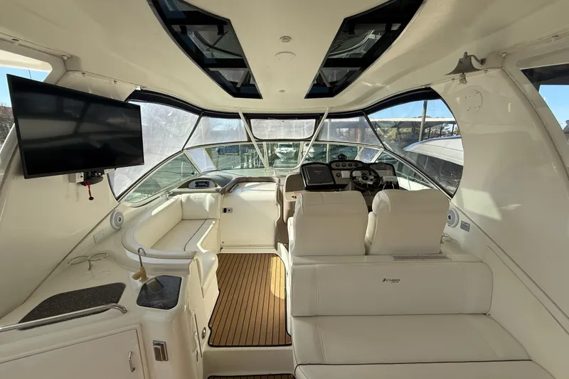 Slide: The Image of Luxurious 2008 Cruisers 455 Motor Yacht interior with plush seating and modern amenities. - 9