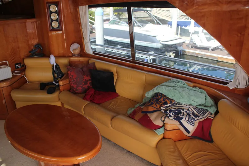 Slide: The Image of Luxurious interior of 1999 Horizon 70 Motor Yacht with leather seating and large window view. - 33