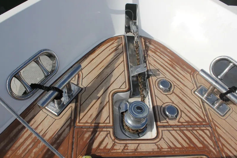 Slide: The Image of Anchor chain and winch on 1999 Horizon 70 Motor Yacht deck. - 63
