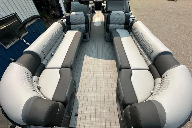 Slide: The Image of 2025 Avalon Excalibur LTD Quad Lounge Windshield with luxurious seating and modern design. - 11