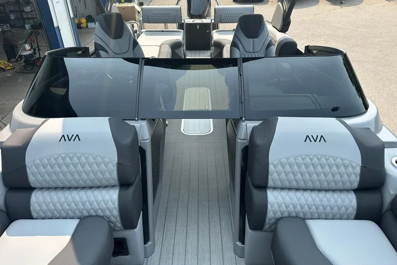 Slide: The Image of 2025 Avalon Excalibur LTD Quad Lounge Windshield with luxurious seating and sleek design. - 13