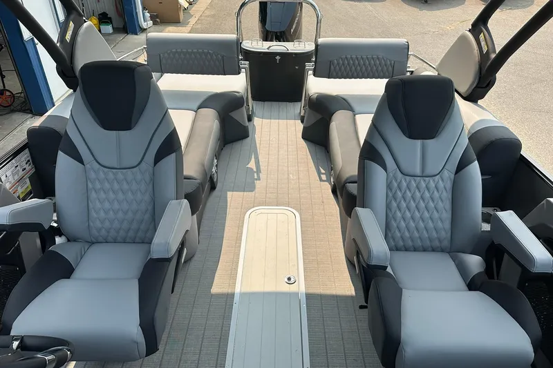 Slide: The Image of Luxurious 2025 Avalon Excalibur LTD Quad Lounge boat interior with plush seating and modern design. - 28