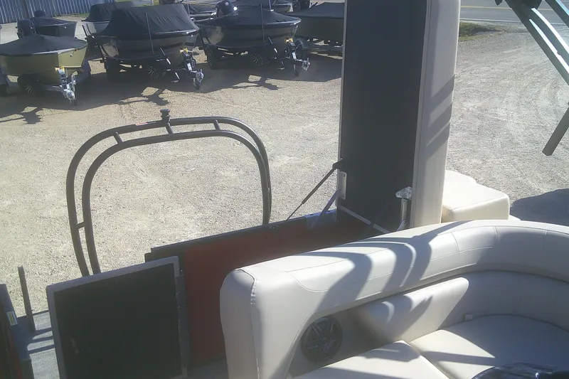 Slide: The Image of 2025 Godfrey Sweetwater 2086 Cruise Special Edition interior with boats in the background. - 11