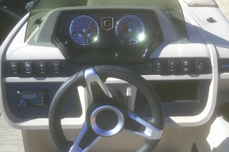 Slide: The Image of Steering console of 2025 Godfrey Sweetwater 2086 Cruise Special Edition boat. - 9