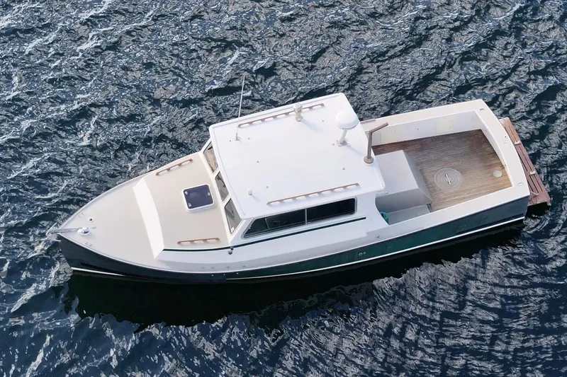 Slide: The Image of 1984 Martin Yachts Lobster Boat on water, aerial view. - 5