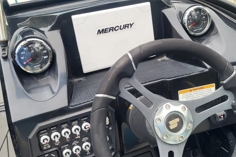 Slide: The Image of Dashboard of 2021 Heyday WTSurf boat with Mercury controls and gauges. - 15
