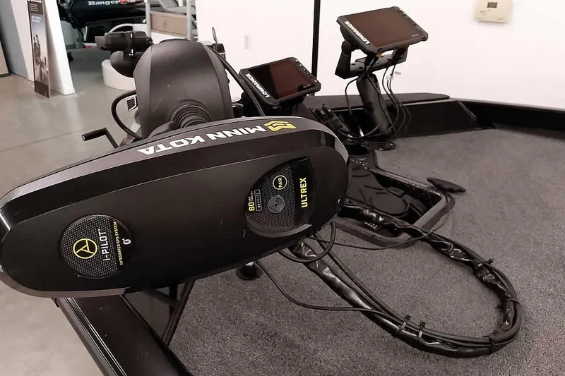 Slide: The Image of 2023 Ranger RT198P boat with Minn Kota Ultrex trolling motor and advanced navigation controls. - 10