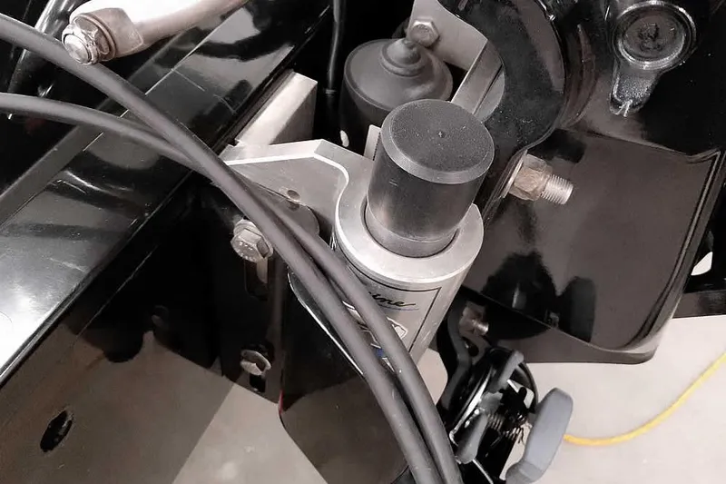 Slide: The Image of Close-up of 2023 Ranger RT198P boat engine components and cables. - 14