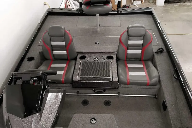 Slide: The Image of 2023 Ranger RT198P boat interior with dual seats and steering console. - 29