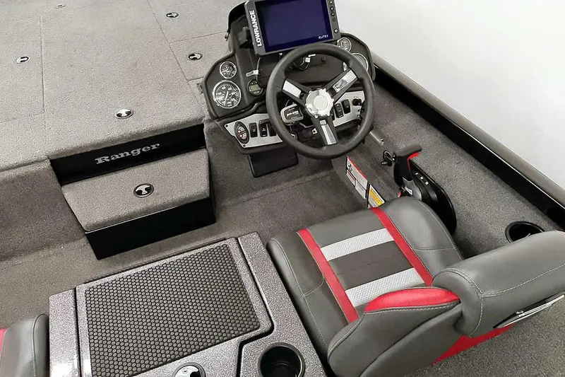 Slide: The Image of 2023 Ranger RT198P boat interior with steering wheel and seating. - 33