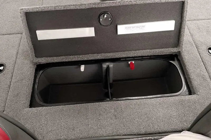 Slide: The Image of 2023 Ranger RT198P boat storage compartment with pump-out feature, open and empty. - 36