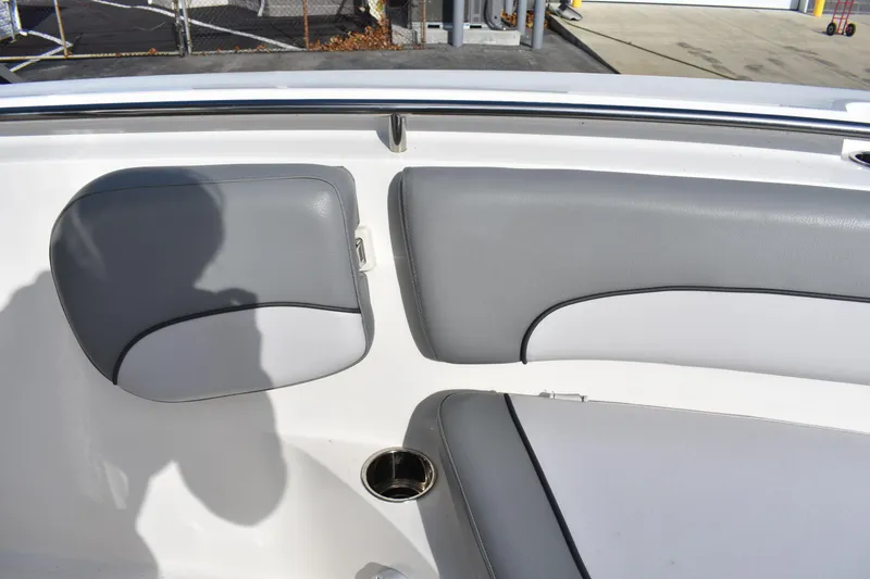 Slide: The Image of Control panel of 2022 NauticStar 2602 Legacy boat with steering wheel and navigation equipment. - 12