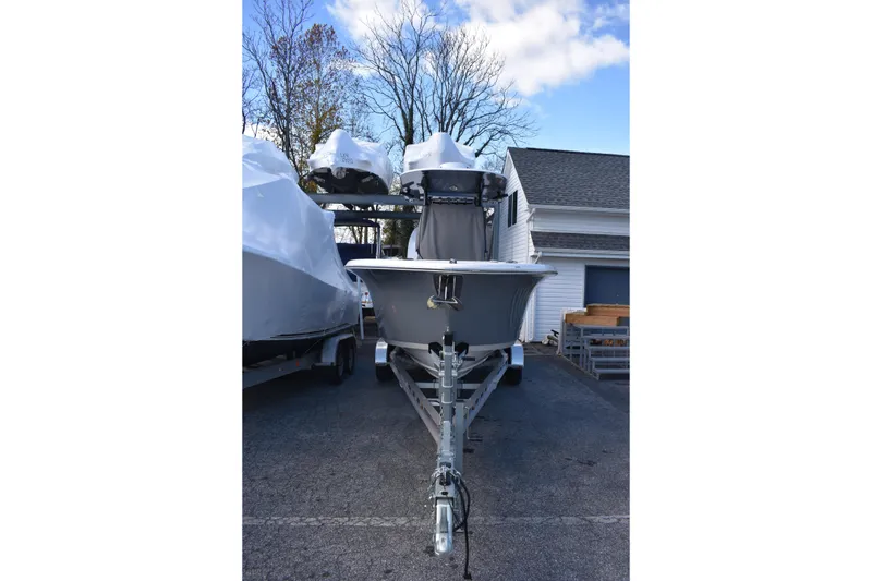 Slide: The Image of 2022 NauticStar 2602 Legacy boat at AM PM Marine dealership. - 2